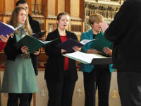Da Capo singing during the Christmas Tree Festival at St Mary's Church, Warwick